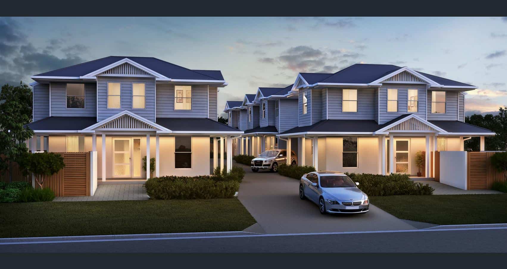 hamptons inspired townhouse complex with two cars driving out