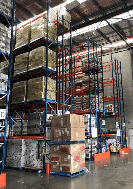 large warehouse with tall shelves of stock